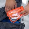 putting in backpack