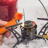 in use lighting camp stove