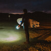 lighting the way with a surfboard